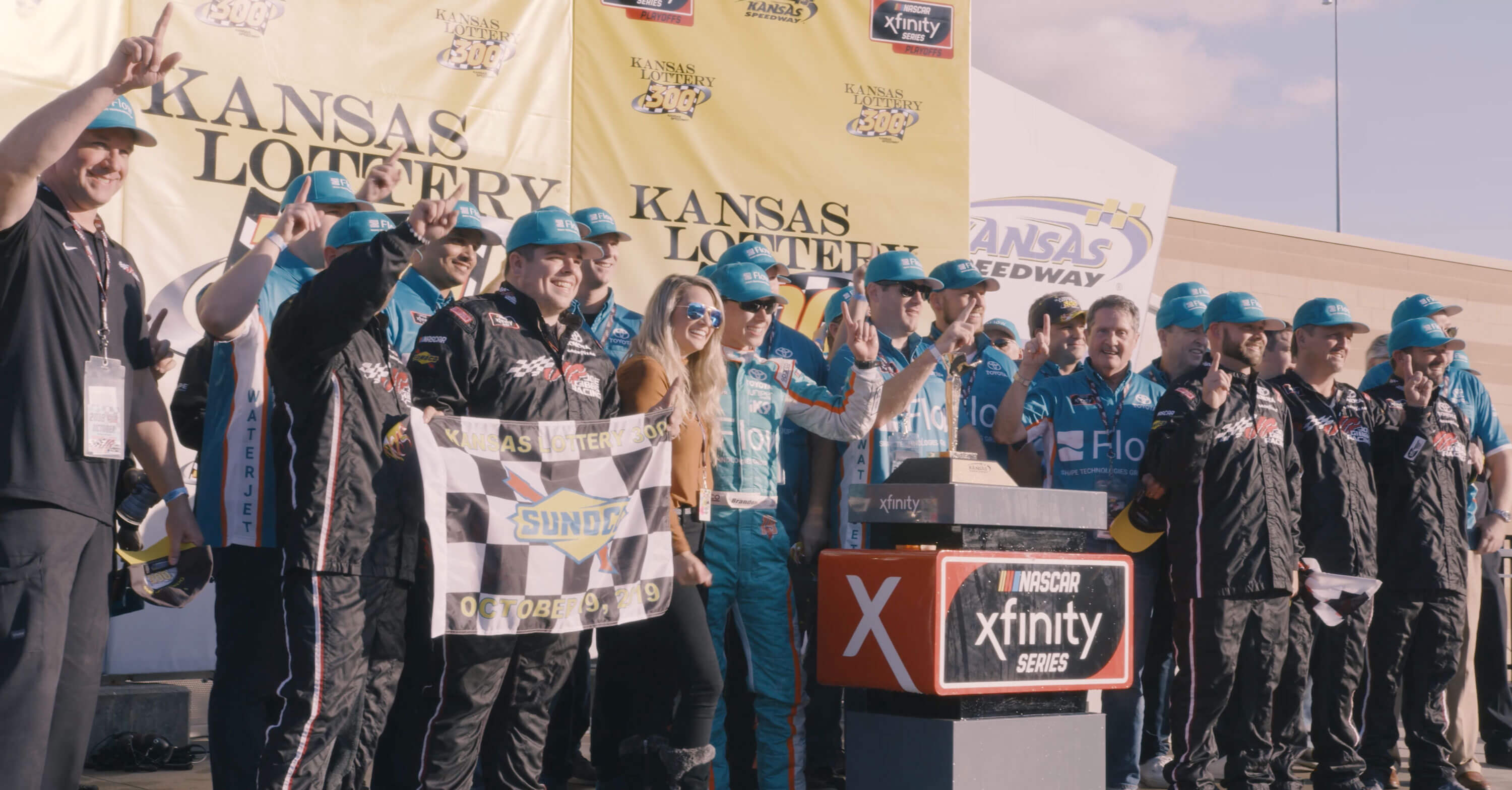 brandon-jones-victory-podium.jpeg brandon jones and team celebrating at podium