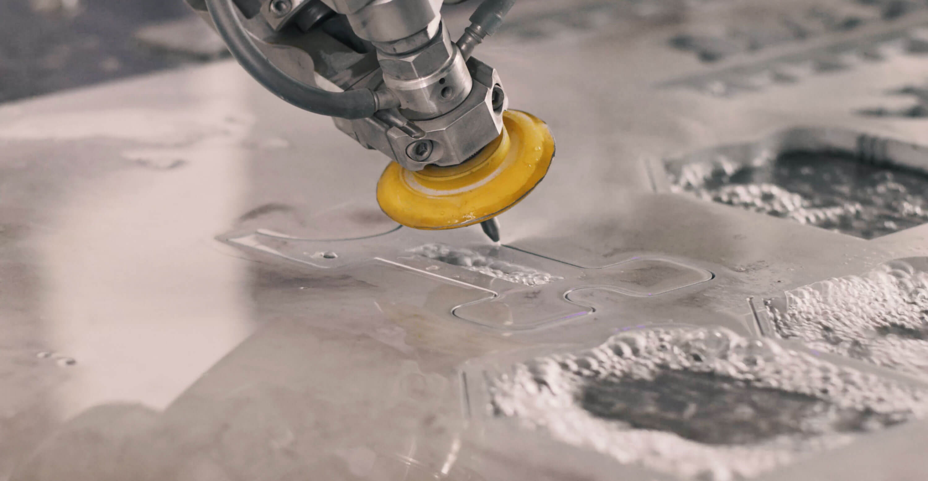 flow-waterjet-cutting-at-jgr.jpeg flow waterjet cutting metal