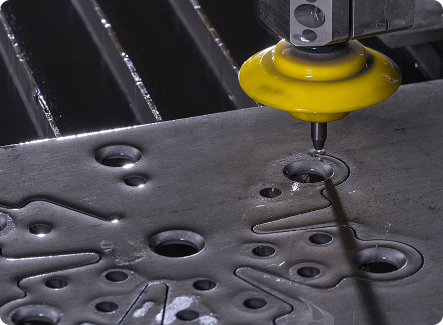 waterjet cutting an intricate snowflake shaped cut part with curved edges