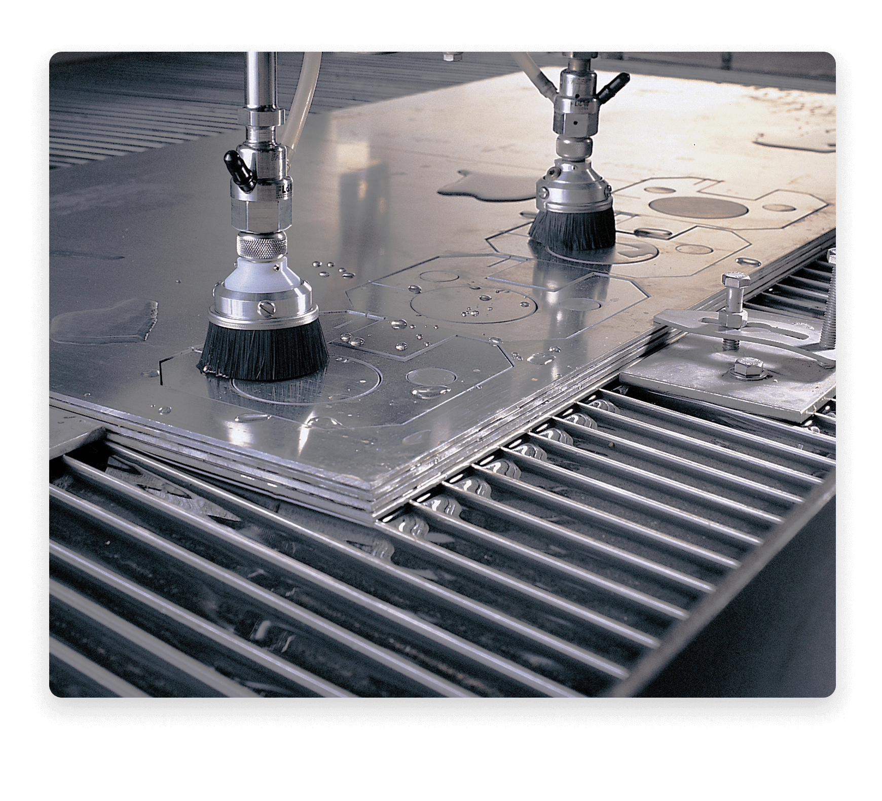 waterjet cutting stacked metal sheets