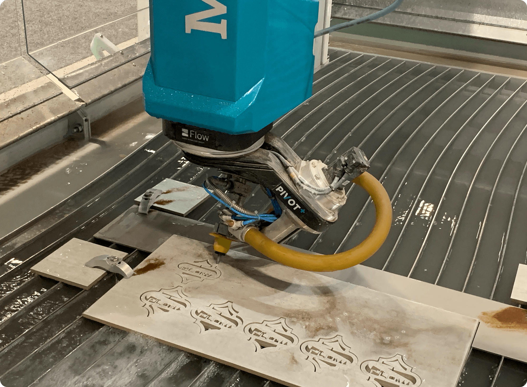 waterjet with UltraPierce cutting stone