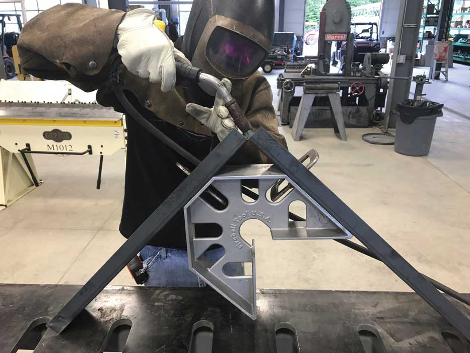 person welding