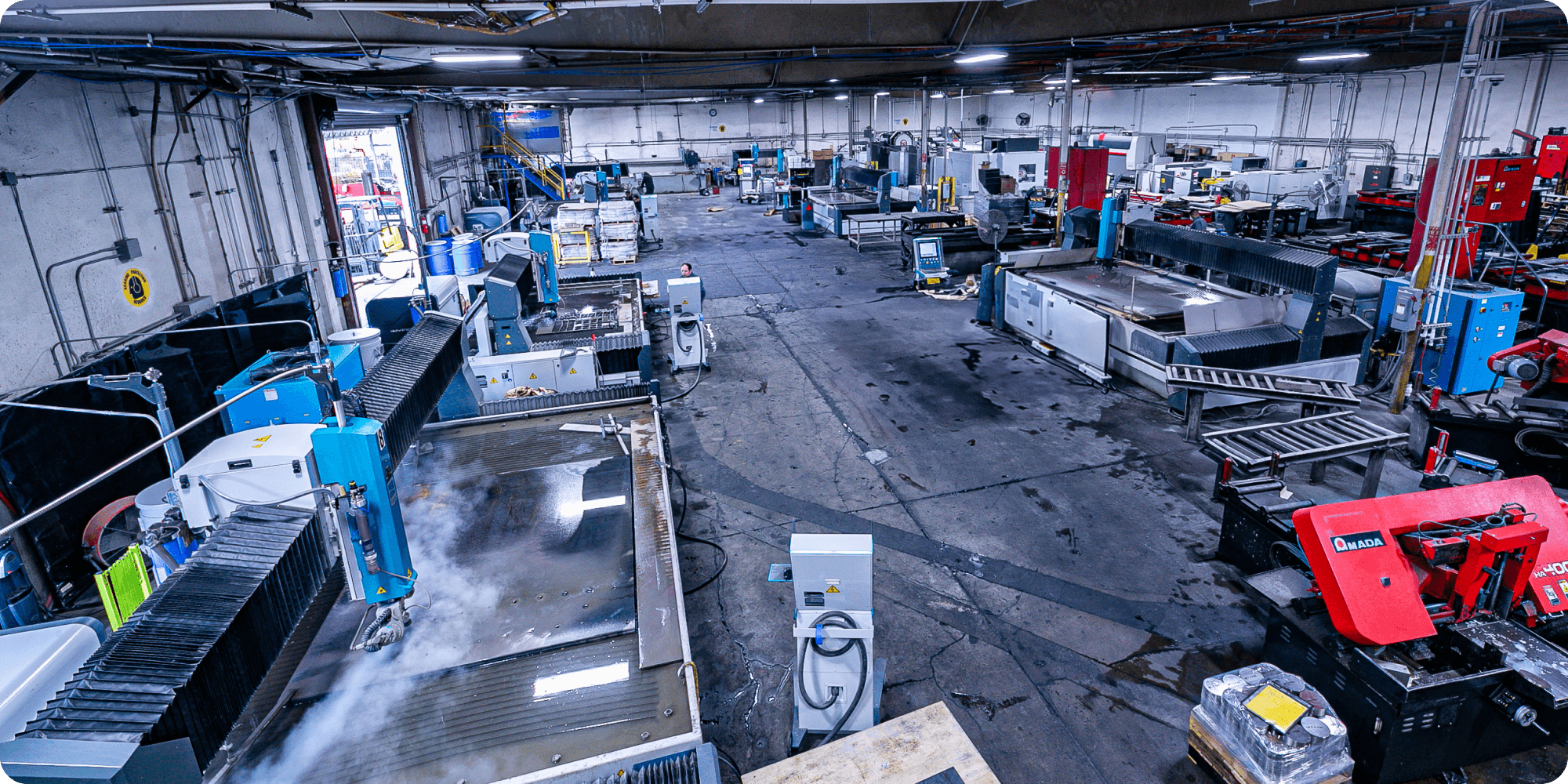 overhead photo of a full metal shop floor