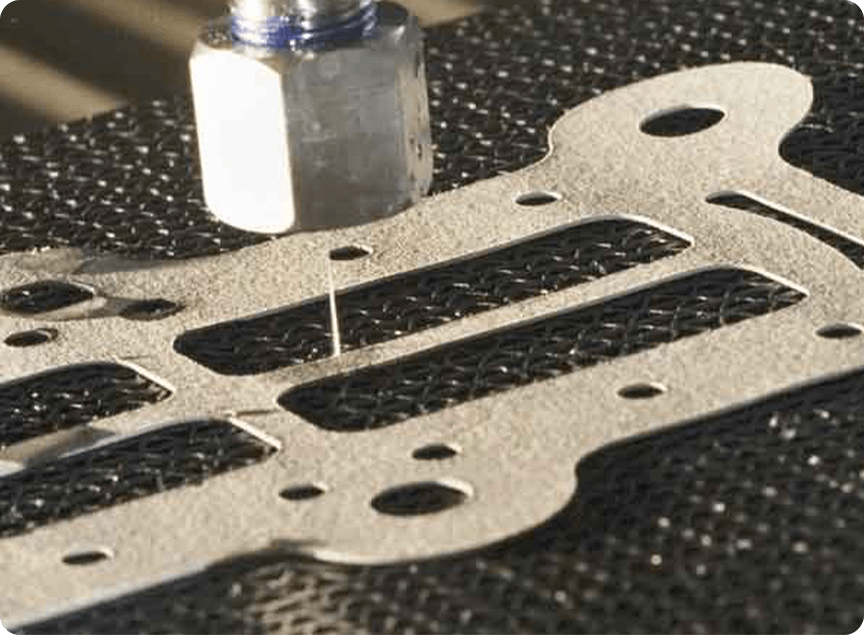 Flow pure waterjet cutting head cutting a gasket